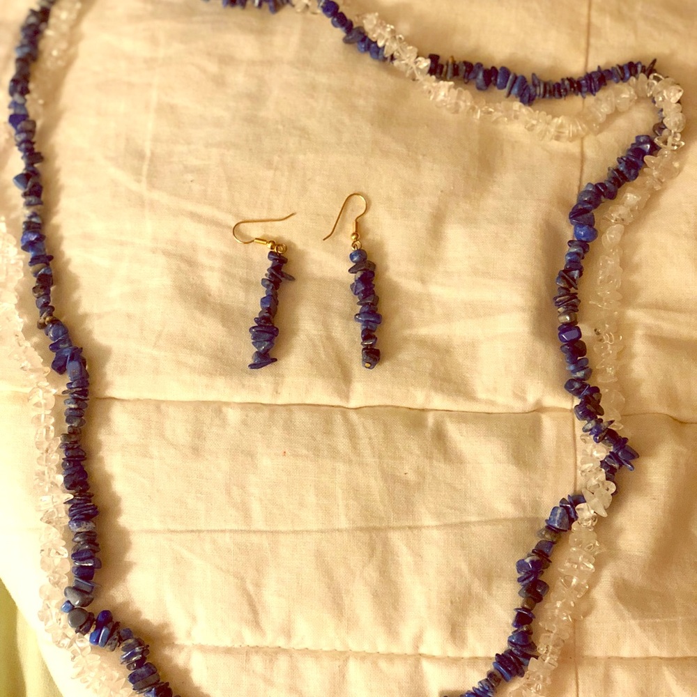 Double strand necklace with matching earrings.